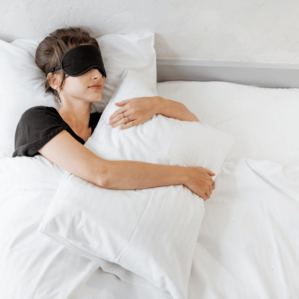woman sleeping with sleeping mask