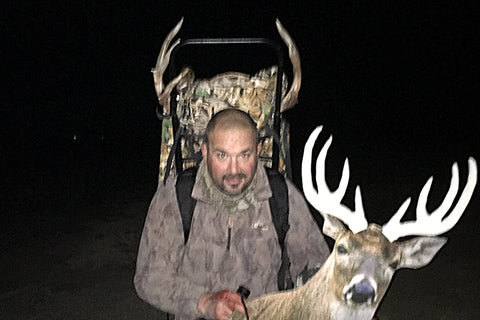 packing out a whitetail buck on Kansas public land