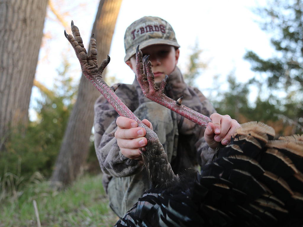 first turkey checking out the turkey spurs