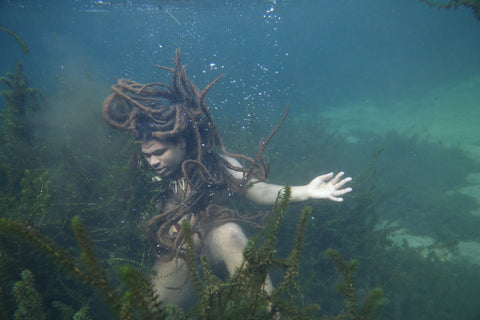 Art photograph of person underwater