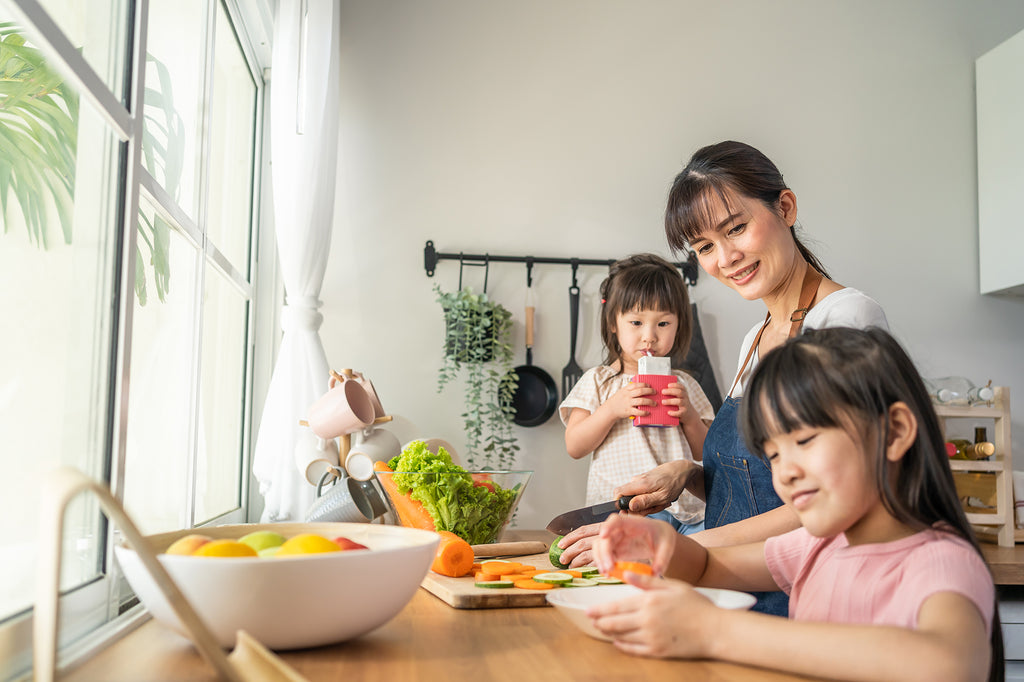 A family preparing a healthy meal together.