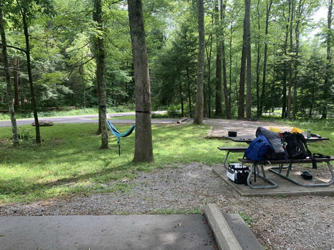 Campsite in wooded area with hammock hanging near the Great Smoky Mountains National Park.