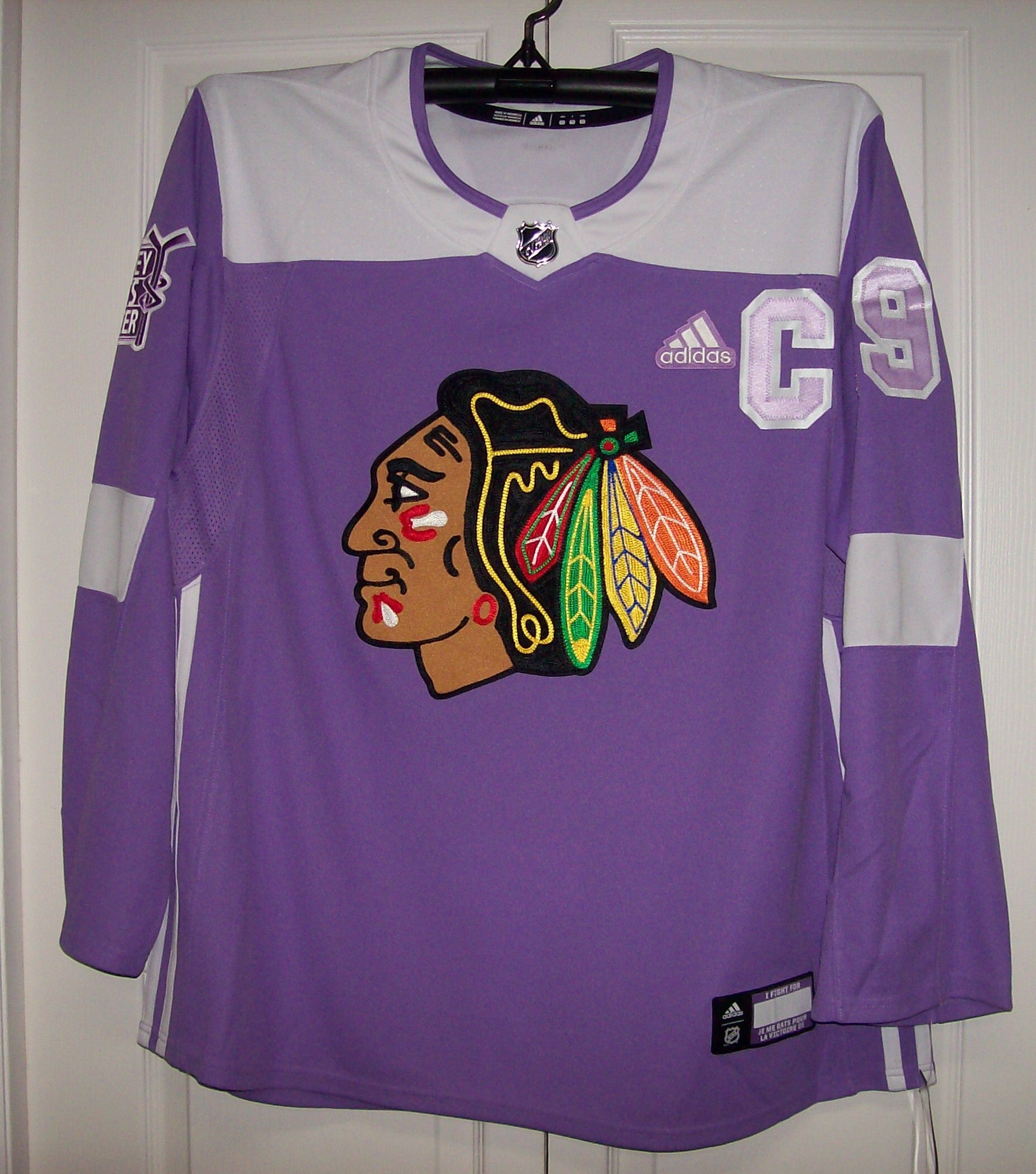 blackhawks lavender jersey