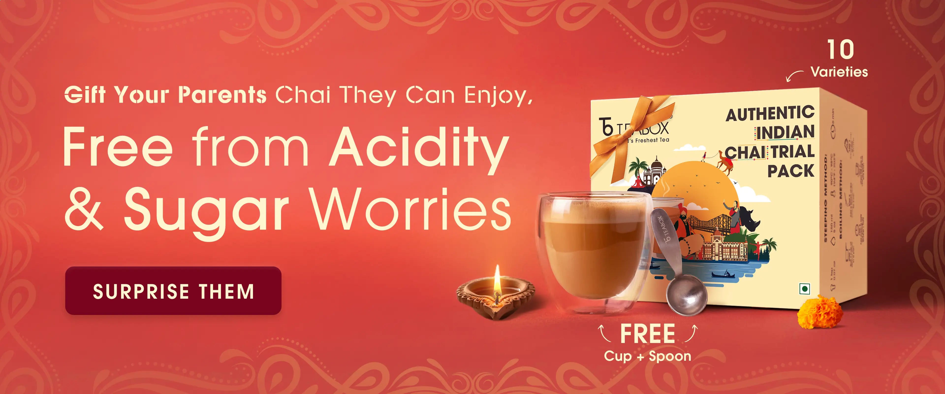 Tea gift set promotion with text about acidity-free Indian chai and a free cup and spoon offer.