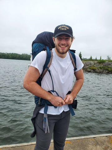 Young Man Backpacking Isle Royale National Park