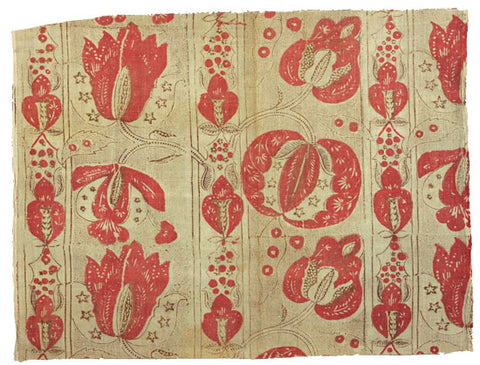 Blockprinted fabric from 18th century France. Red print of natural base.