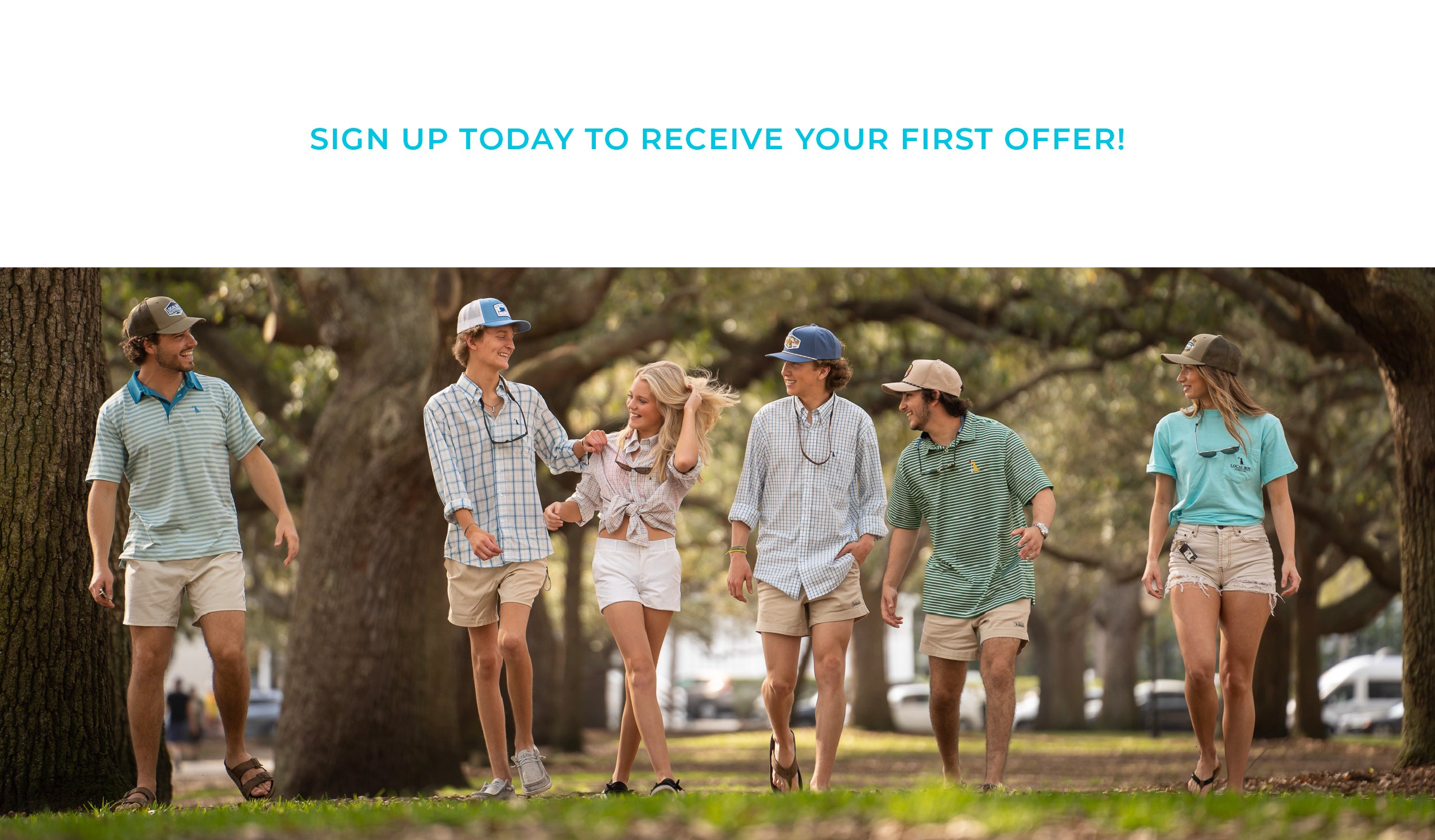 sign up today to receive your first offer! group of friends walking towards the camera in a photoshoot