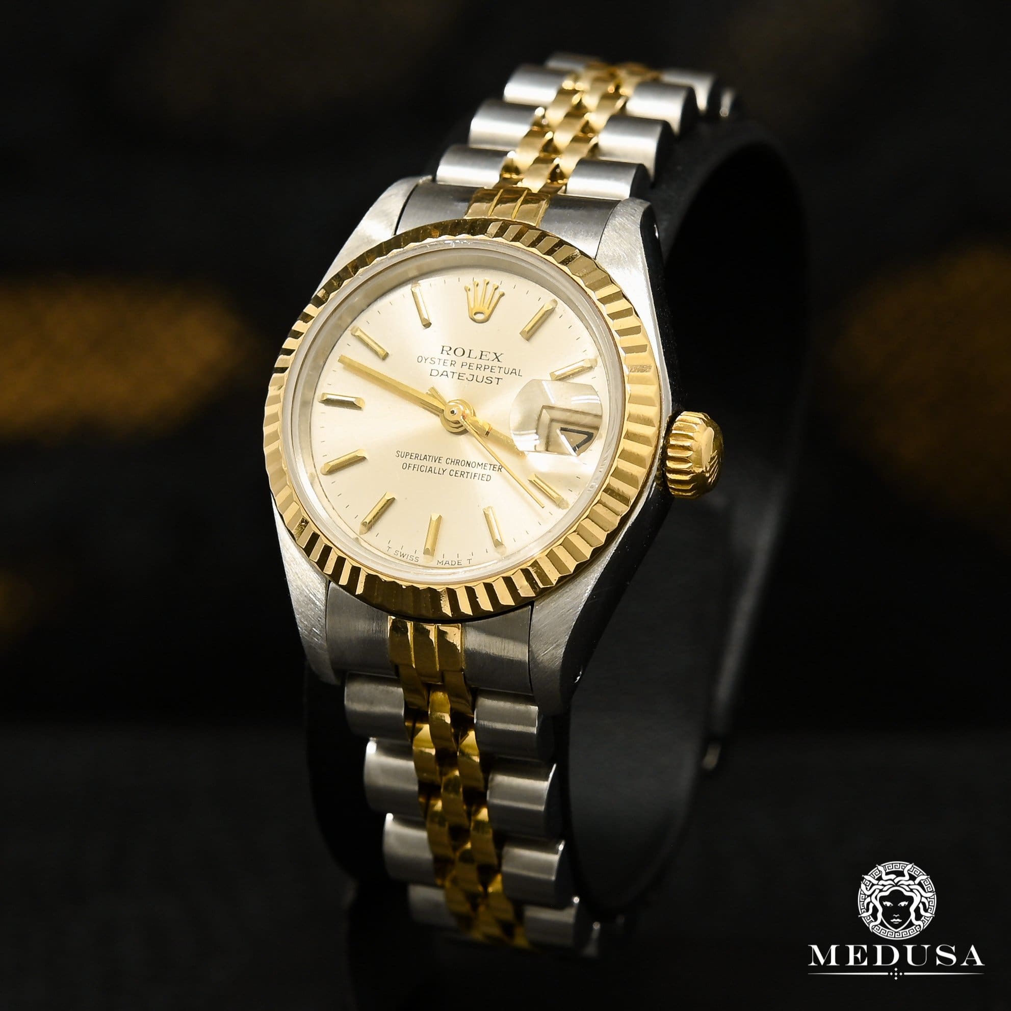 rolex women's watch silver and gold