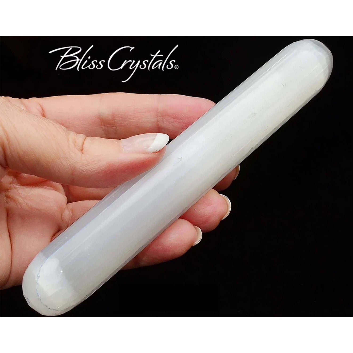 https://cdn.shopify.com/s/files/1/1869/1587/products/6-inch-selenite-wand-tapered-ends-sw29-919.jpg?v=1666165420