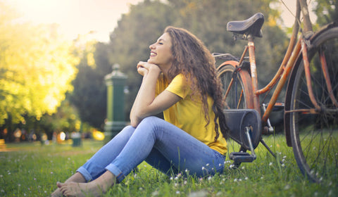 An uplifting image capturing a girl grounded on grass, radiating joyful energy while holding a Carnelian crystal. The metaphysical properties of Carnelian promote emotional expression, boost positivity, and enhance feelings of joy. #GroundedOnGrass #JoyfulEnergy #EmotionalExpression #CarnelianCrystal #MetaphysicalProperties #PositivityBoost #Happiness #Vitality #CrystalHealing