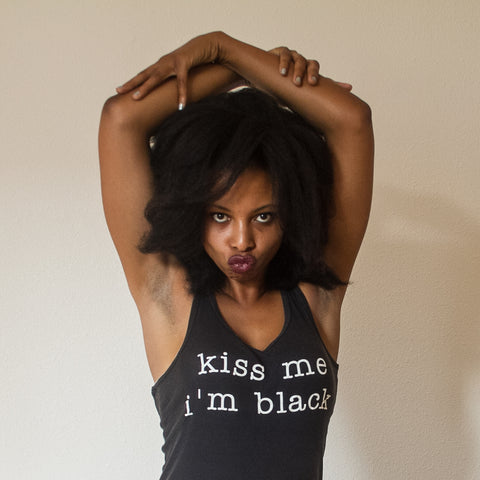 Alexandria Boddie wears a unisex tank that says "kiss me i'm black"