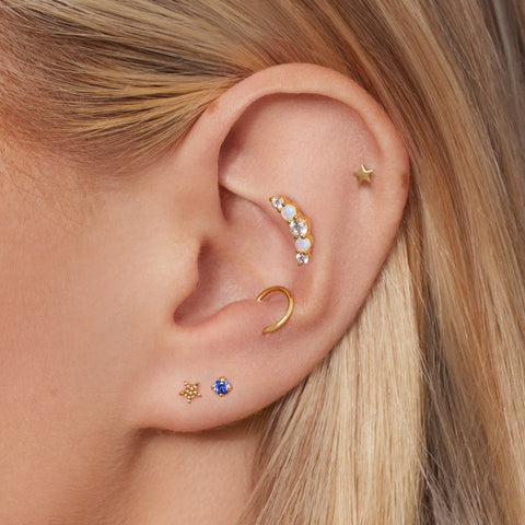 How to avoid an infected ear piercing, according to a doctor | Skin | Get  The Gloss