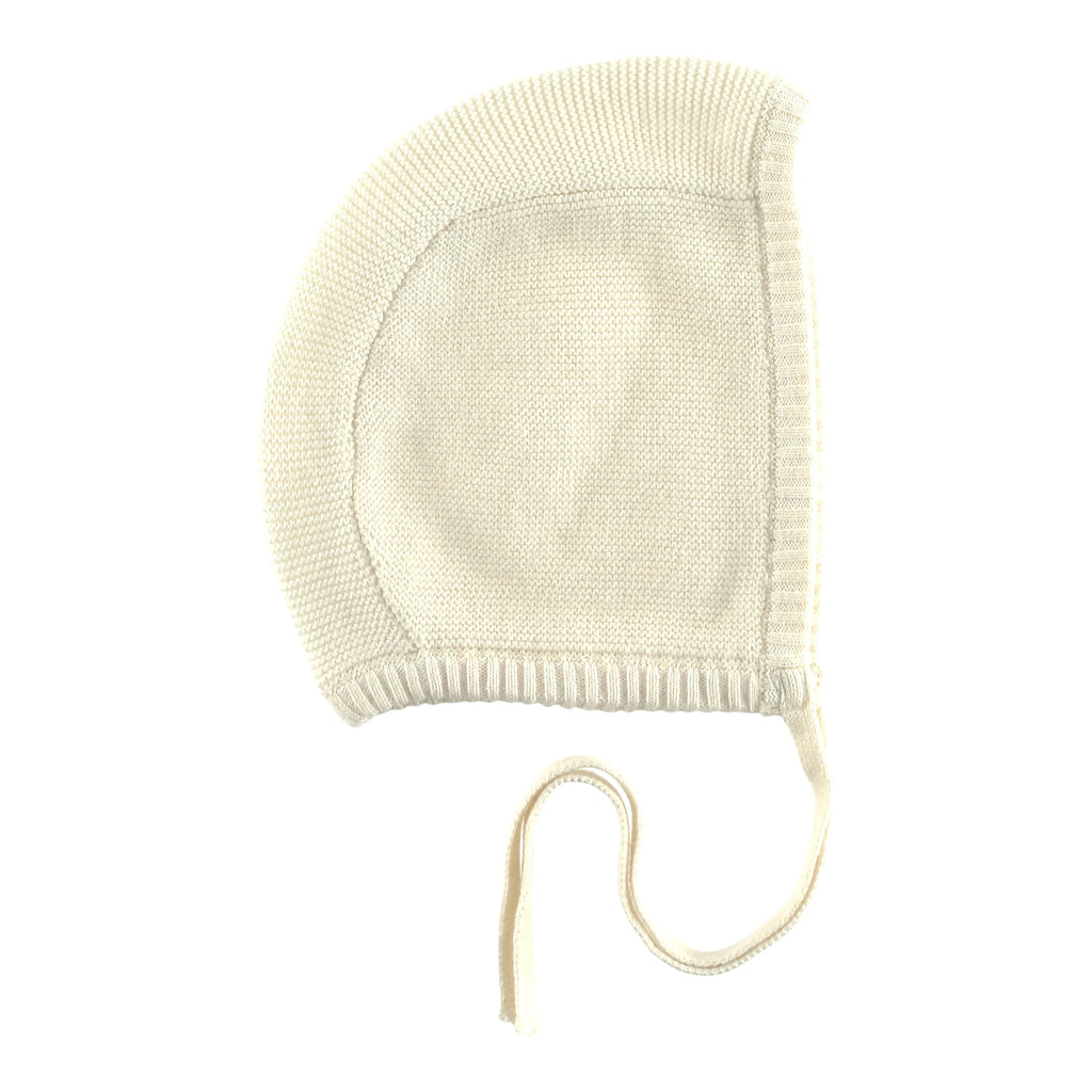 white knitted baby bonnet