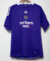 purple newcastle away kit