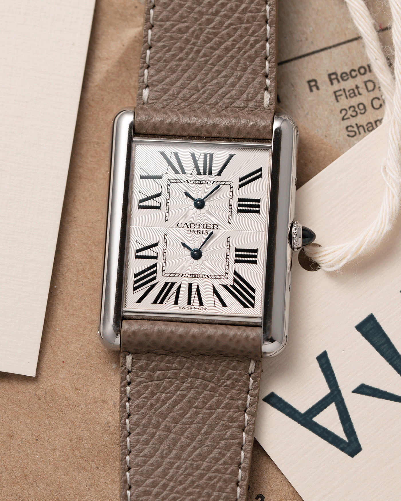 cartier tank dual time