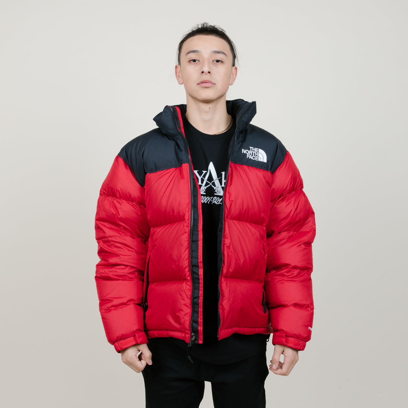 north face red and black puffer