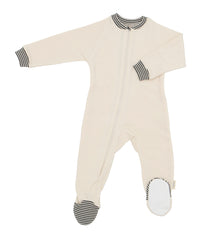 Long sleeve fleece footie pajamas in natural with grey and natural striped trim at neck, cuffs, and toe box area.