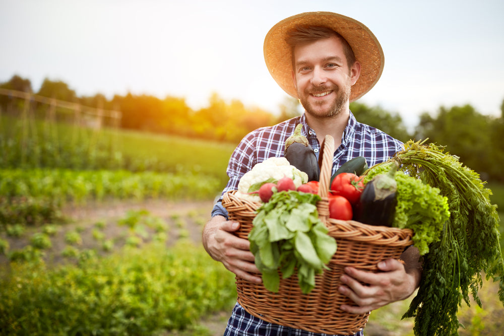 Farmer with locally grown produce