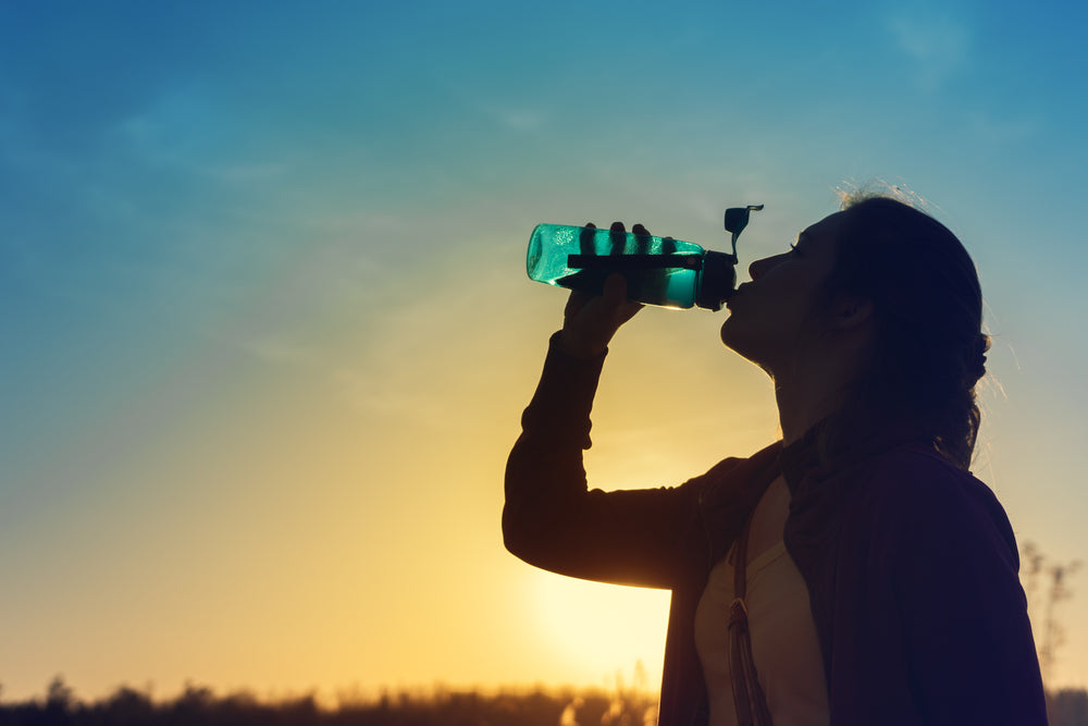 Woman rehydrating – Image from Shutterstock