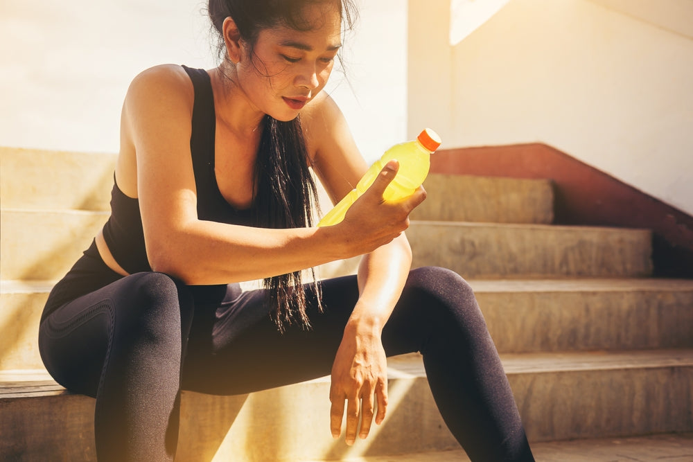 Woman rehydrating -Image from Shutterstock