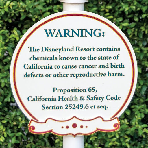 A borad with message: WARNING: The Disneyland Resort contains chemicals known to the state of California to cause cancer and birth defects or other reproductive harm. Proposition 65, California Health & Safety Code Section 25249.6 et seq