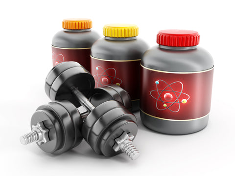 Dietary supplement bottles with dumbells.