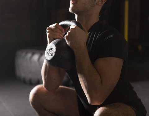 Young athlete exercising goblet squats