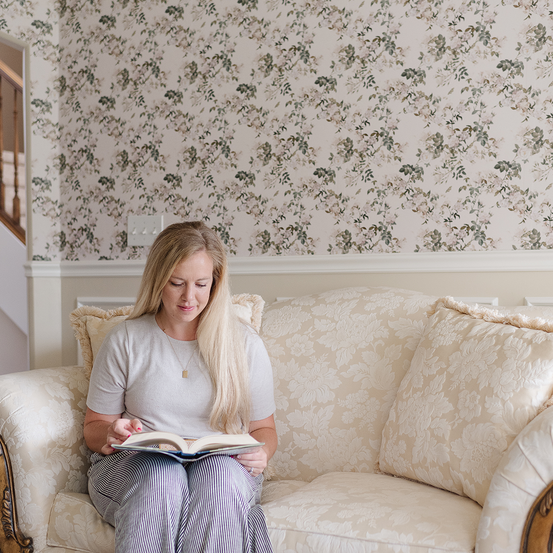 Woman reading in living area