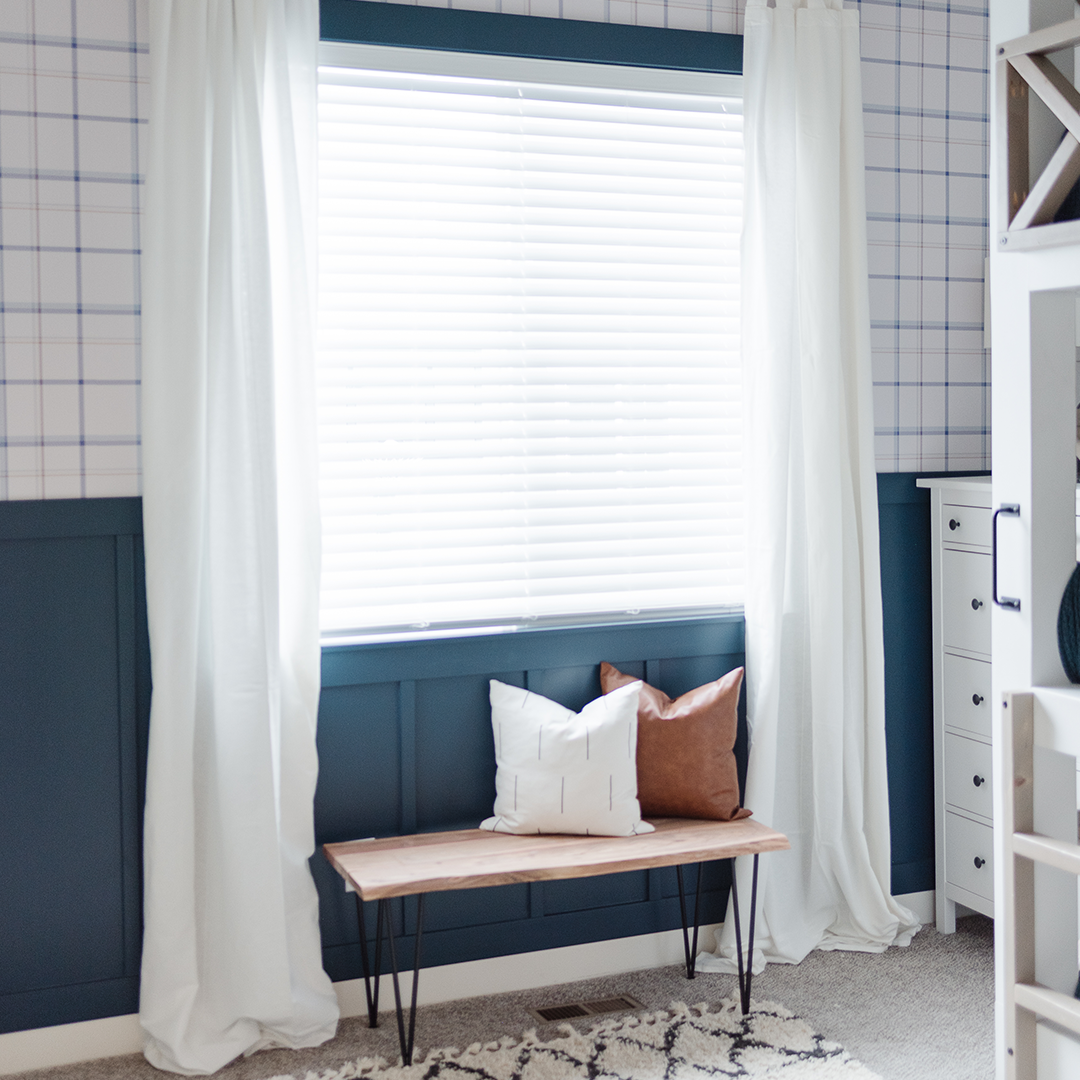 Geometric wallpaper in a blue room