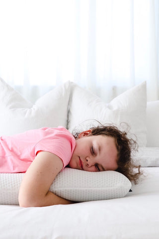 Girl sleeping on pillow 