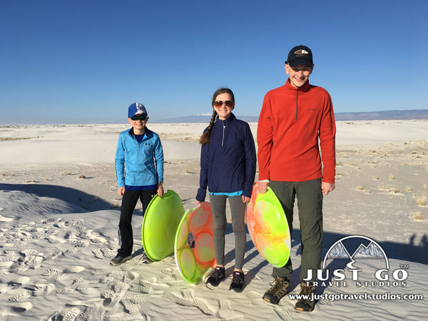 sledding in White Sands National Monument