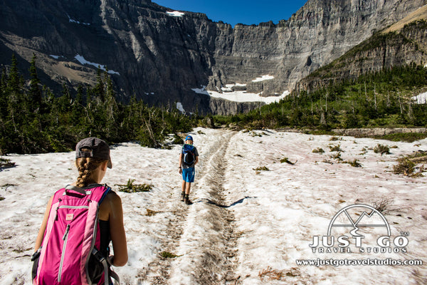 Snow covering the trail near Iceberg Lake in Glacier National Park