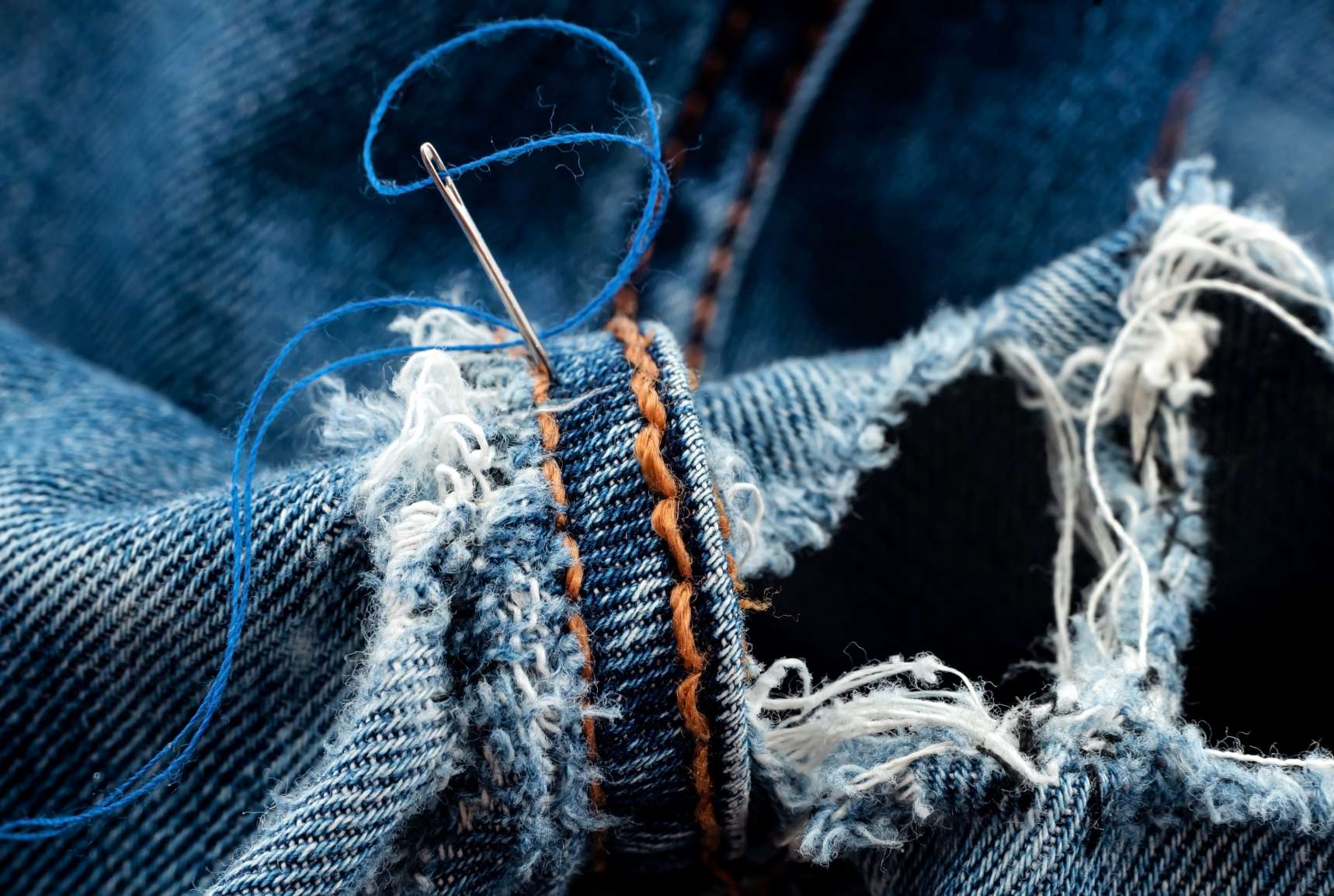 Sewing repair on jeans using natural threads
