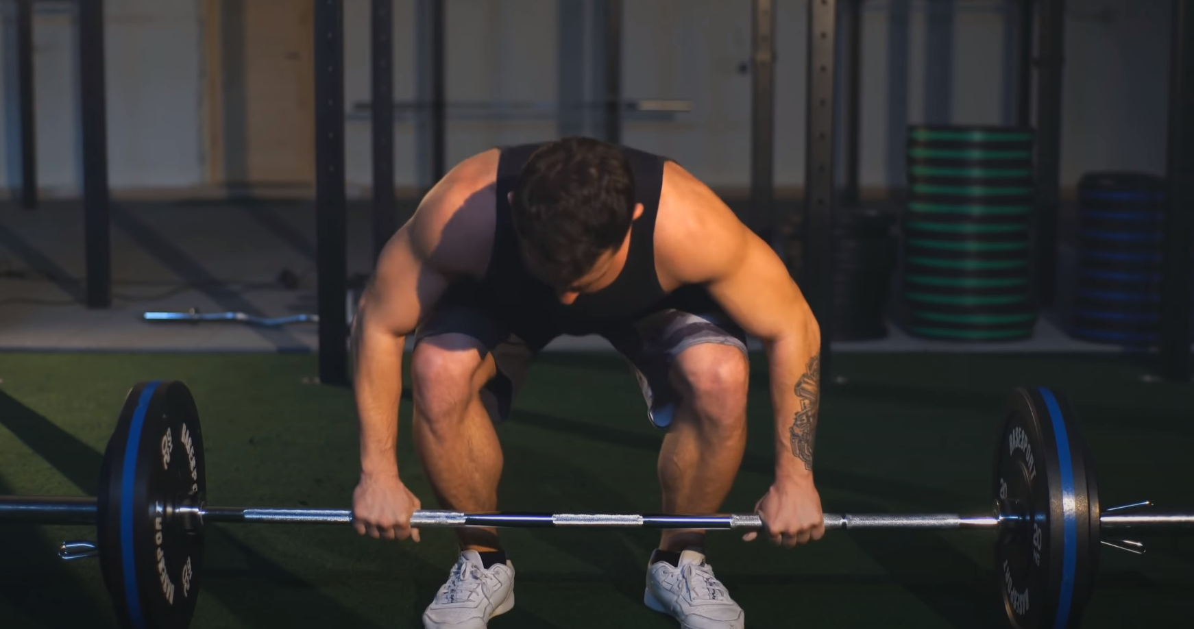 man performing a deadlift