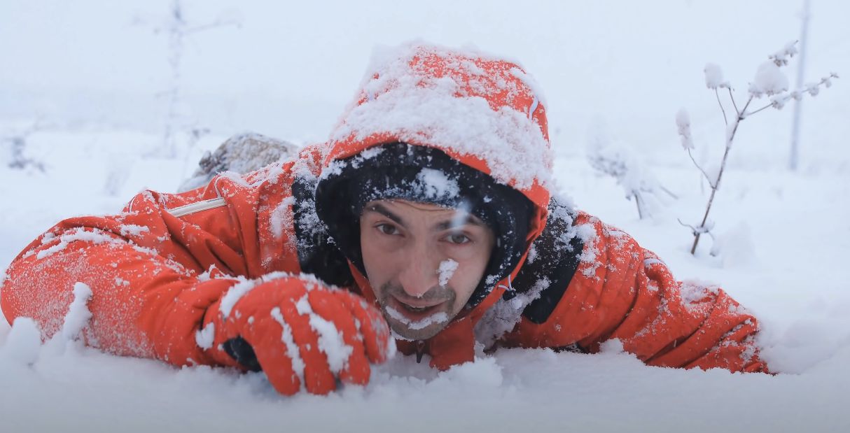 man exhausted from extreme cold