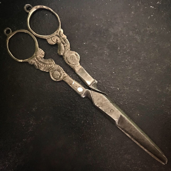 Antique figurative scissors