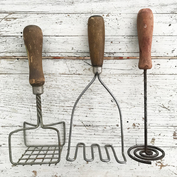 antique potato masher