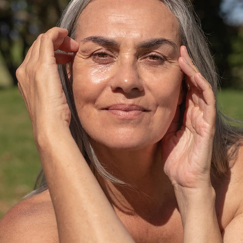 Woman with grey hair smiling