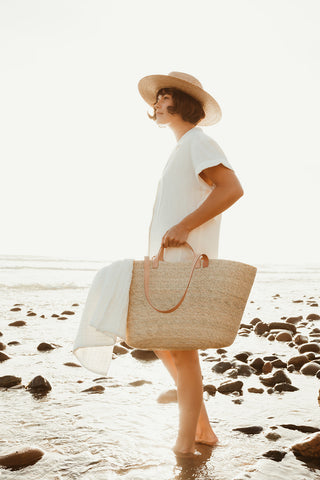 An oversized, resort ready tote bag, the La Plage straw tote is the perfect beach bag for summer.