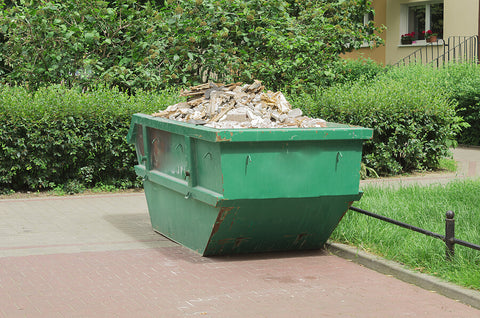 Image of rubble stored in a large metal container