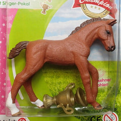 Trakehner Foal with Trophy  Schleich 82926   Introduced: 2015; Retired: 2015   Special Edition Schleich Bayala Magazine Editions - October 2015, a special magazine, featuring plays with the activity set 42160 for show jumping.