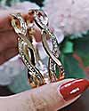 Infinity-Twinkle-Crystal-Bracelet-shown-woman-hand-palm