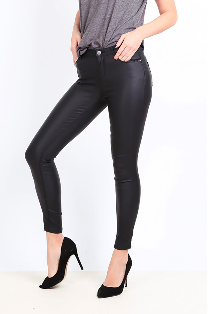 coated black skinny jeans