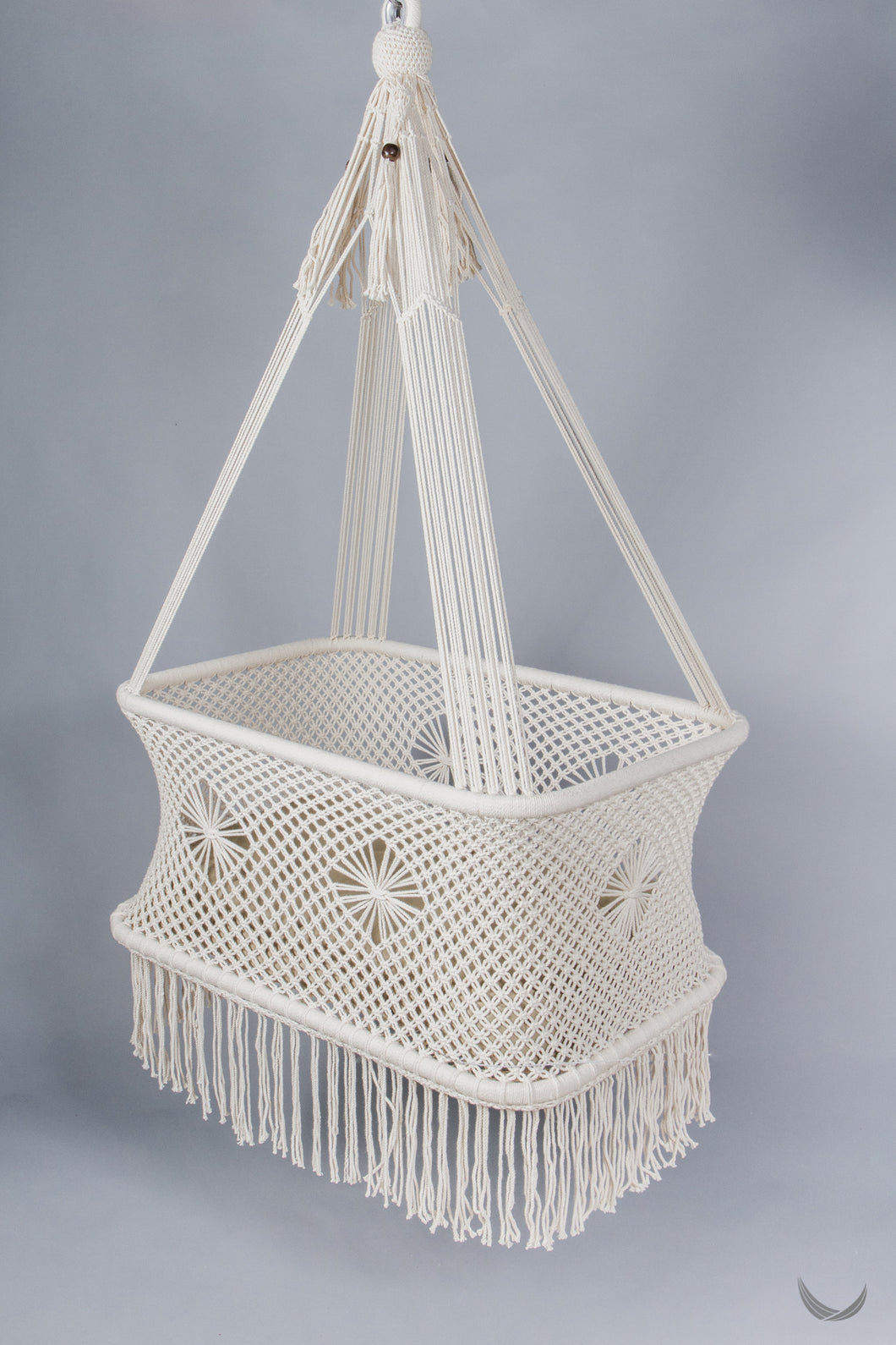 macrame hanging baby crib