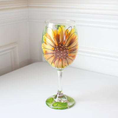 Wine glass hand painted with a sunflower design