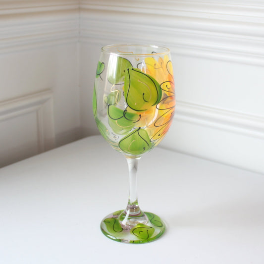 https://cdn.shopify.com/s/files/1/1886/6123/products/sunflowerhandpaintedwineglass2.jpg?v=1669781185&width=533