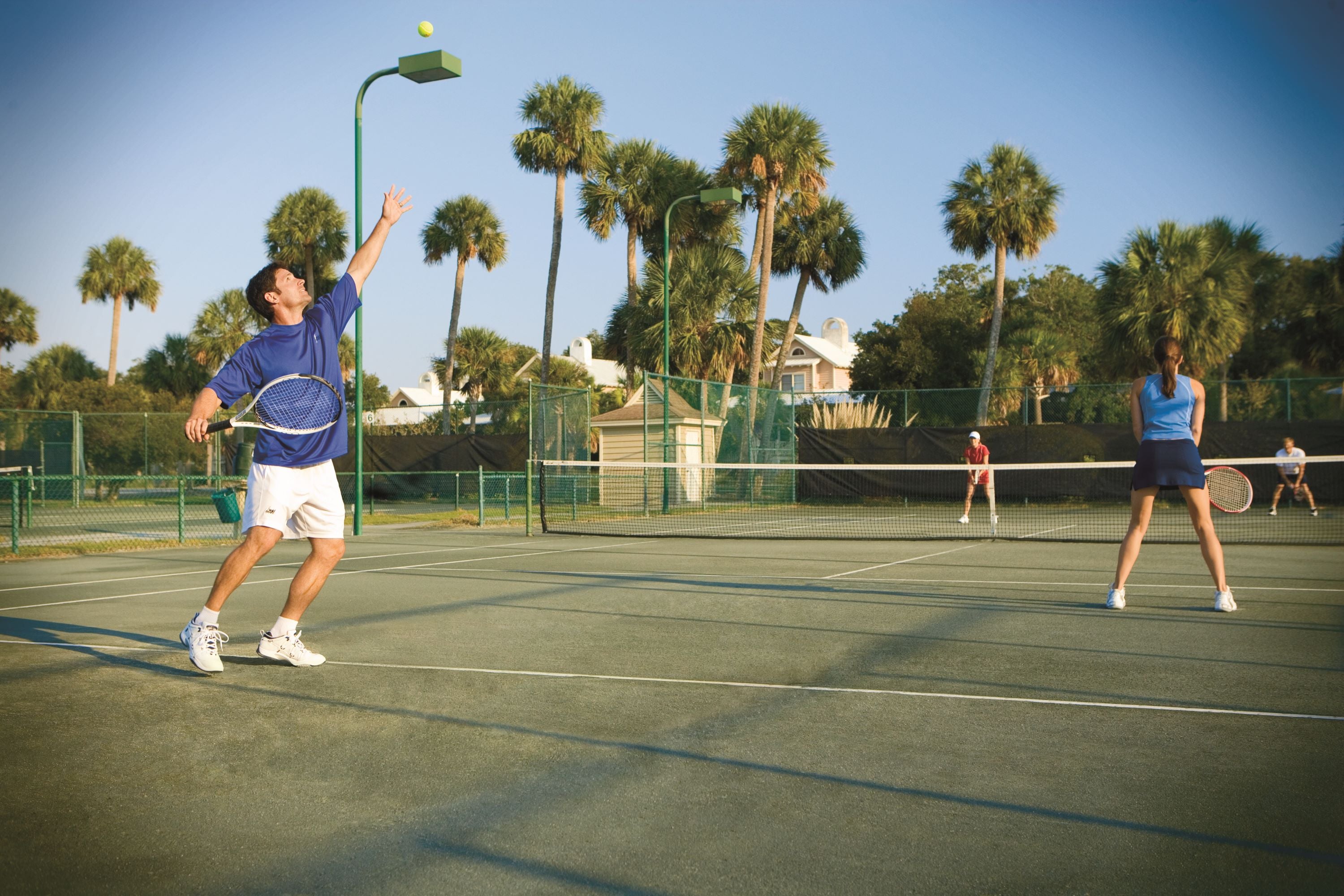 Playing tennis at the Wild Dunes Resort