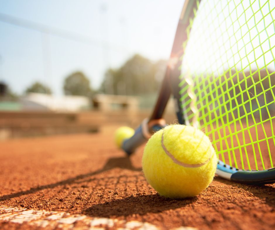 Tennis racquet on court
