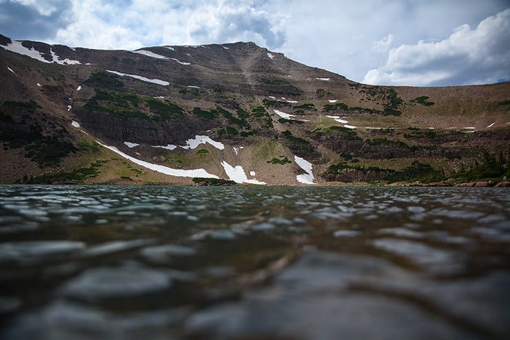 Alpine lake seen from water surface