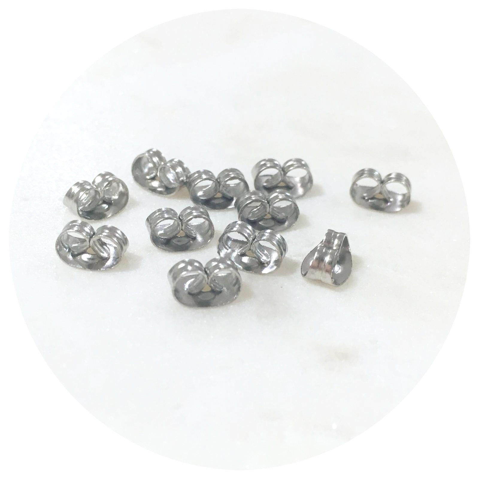 JPM Beads 100 Pcs Package Silver Bullet Clutch Earring Backs with Silicone  Pad Earring Backings Studs